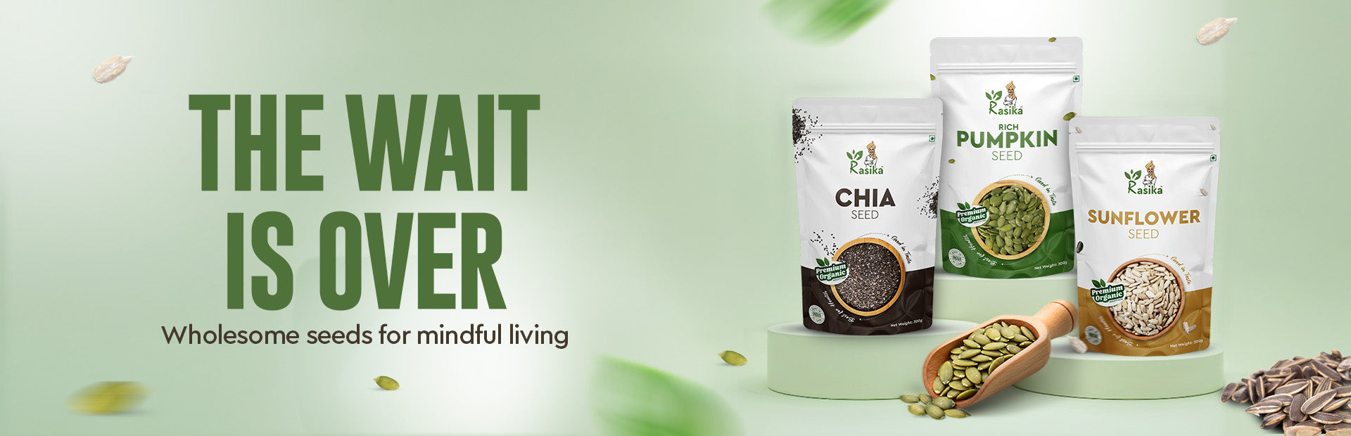 Three packages of pumpkin, chia, and sunflower seeds with text 'The Wait is Over' on a green background.